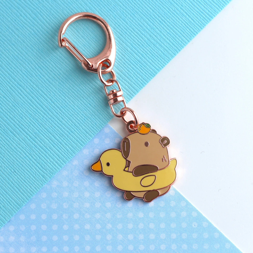 Capybara in Duck Floatie With Yuzu Enamel Keychain