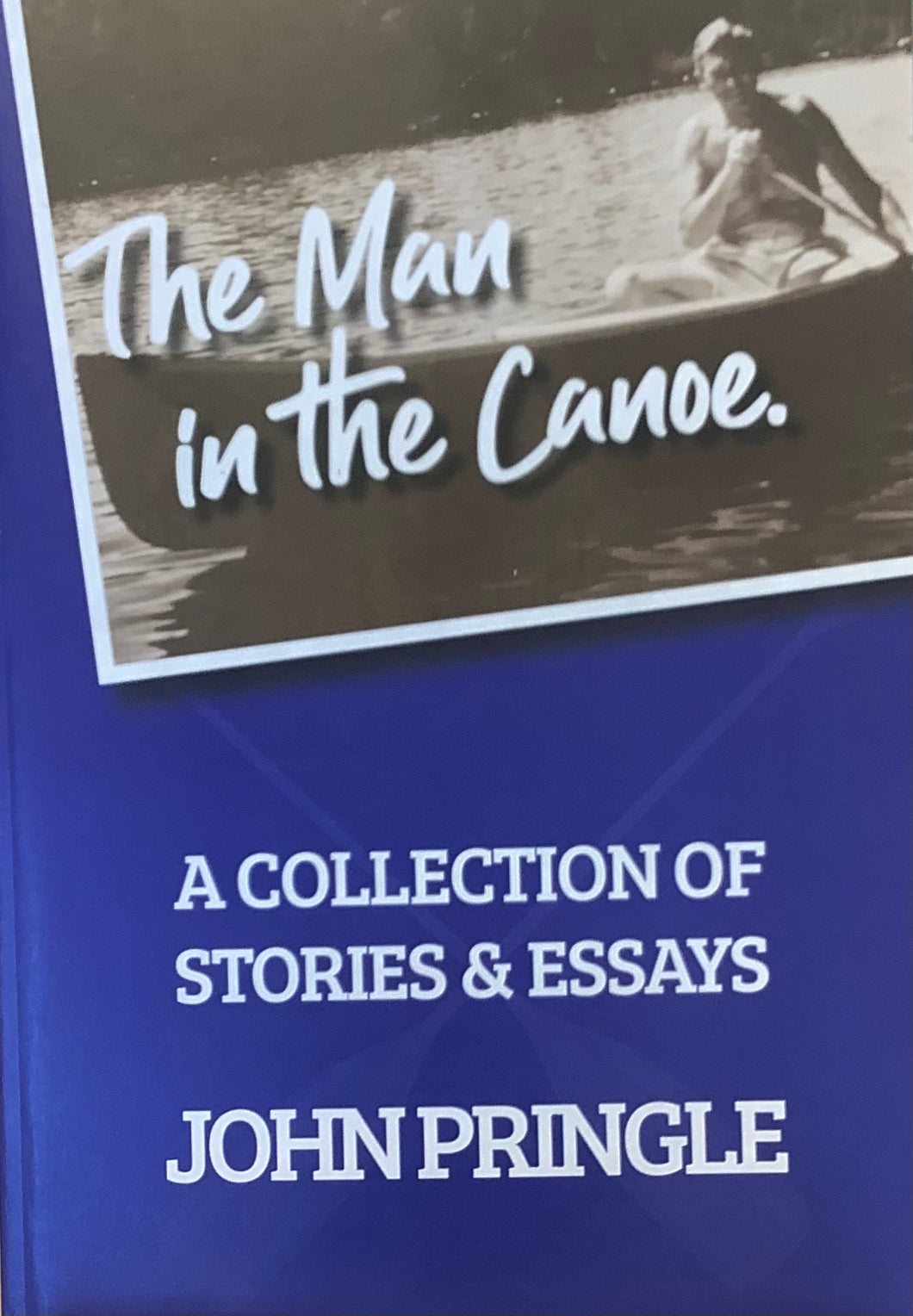 The Man in the Canoe: A Collection of Stories and Essays