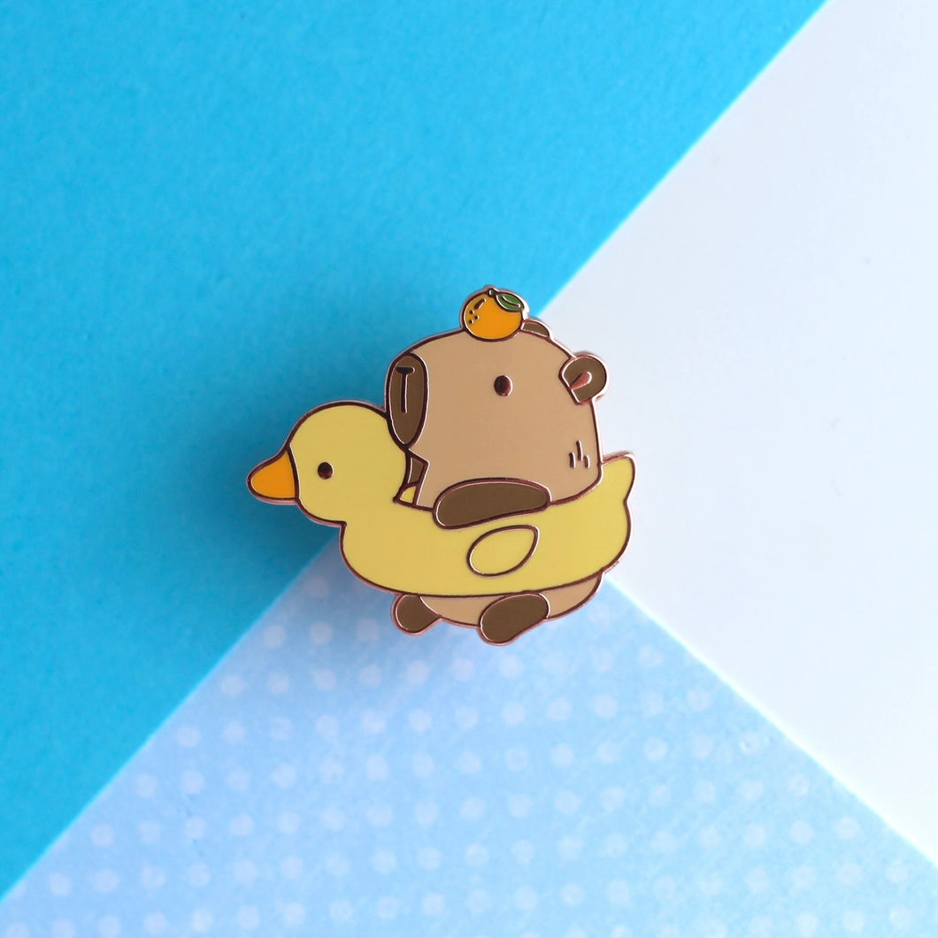 Capybara in a Duck Floatie with Yuzu Enamel Pin